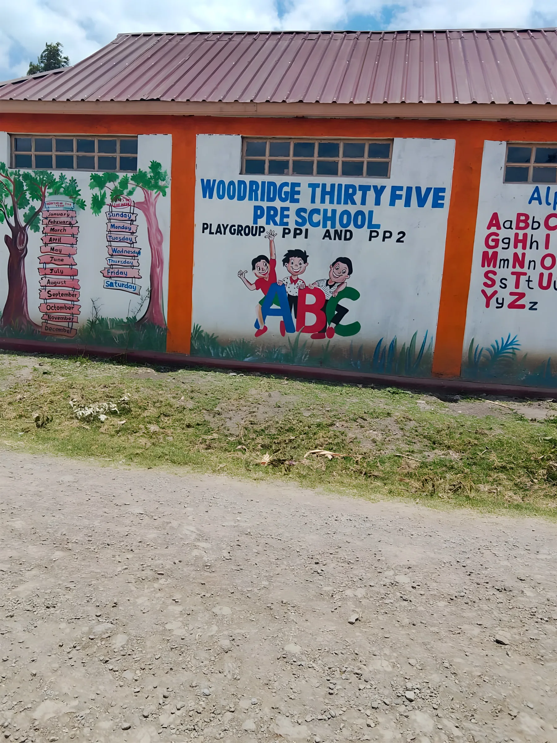 Preschool sign and alphabet mural